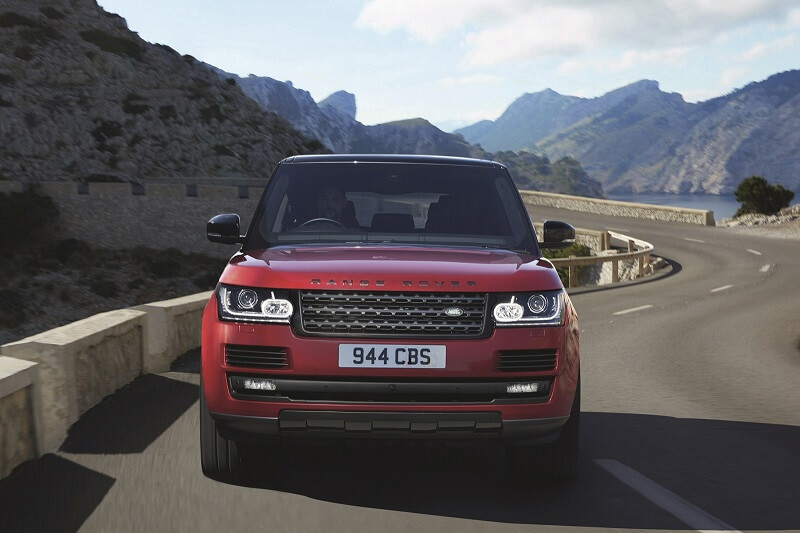 Land Rover Range Rover Estate front view driving on mountain road