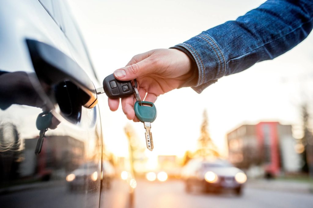 woman opening car