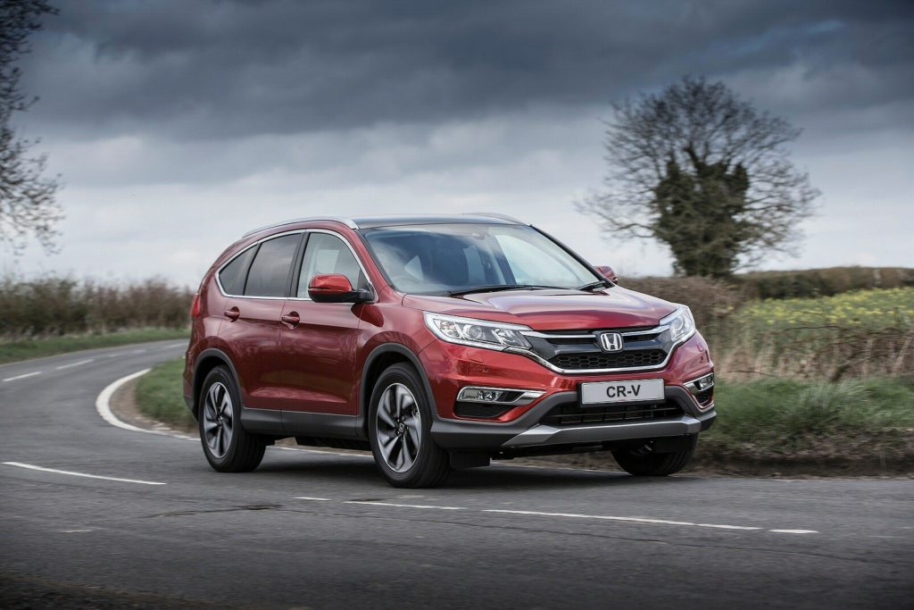 Red Toyota CR-V 2015 on the road