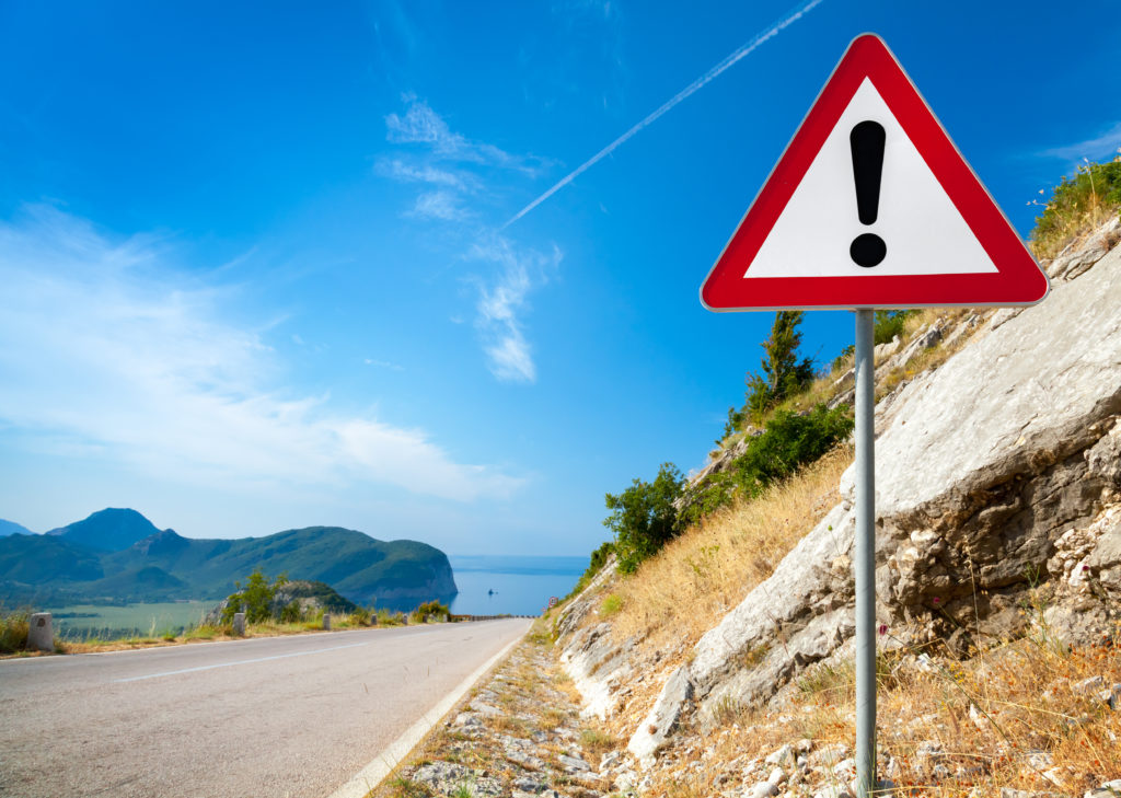 Road sign mountain road